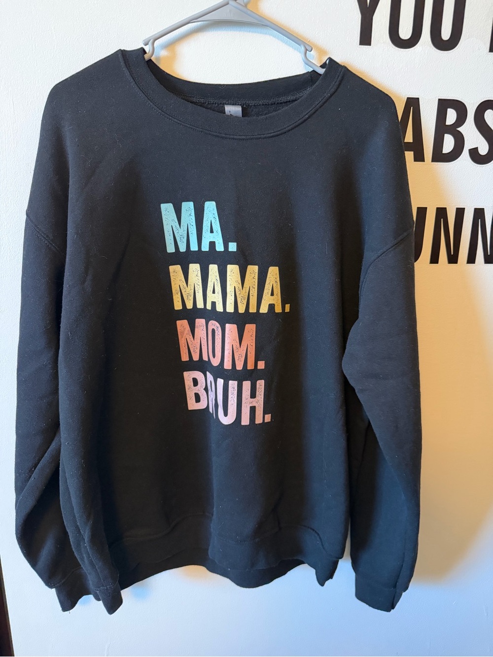 Black Crewneck Sweatshirt with Colorful Stacked Text